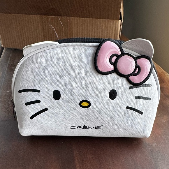 Crème Handbags - Crème x Hello Kitty makeup bag